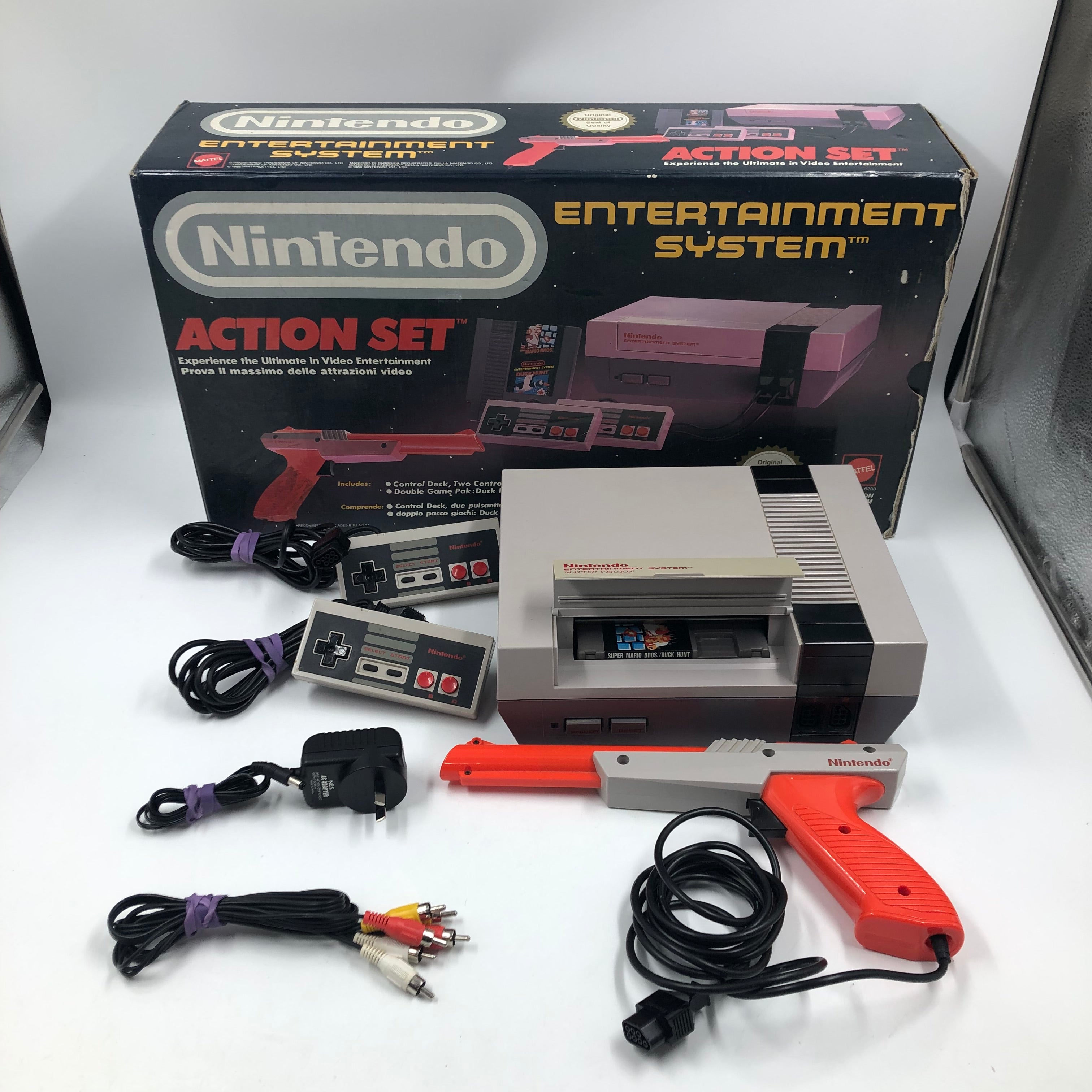 Nintendo Entertainment System Action Set sold in Gray Video Game Console