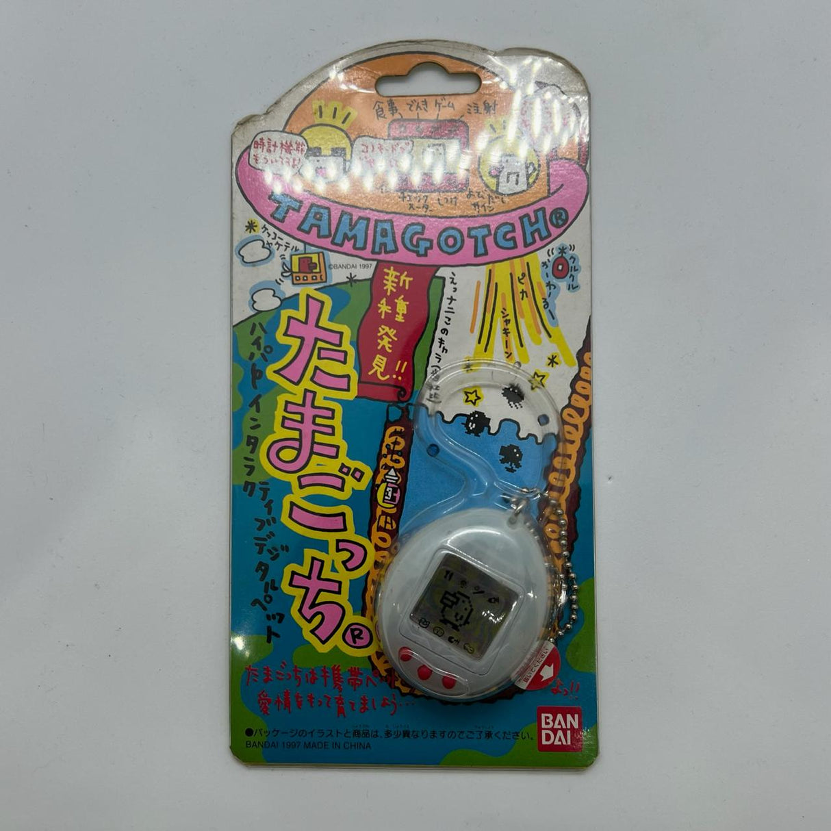 Bandai Tamagotchi Clear White First generation 1997